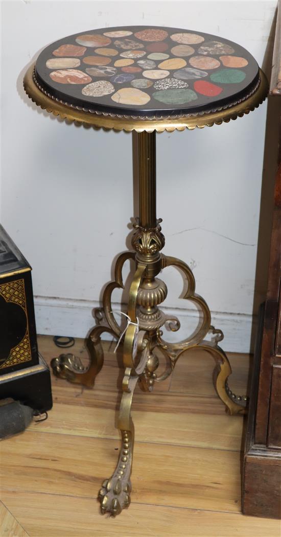 A circular specimen marble top brass tripod table, Diameter 38cm, H.72cm